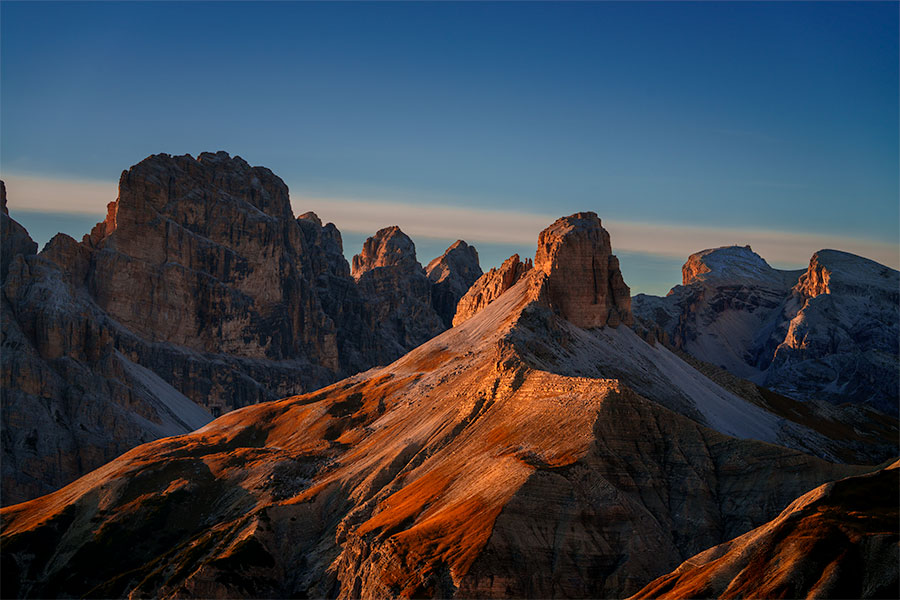 Morning light on rugged ridges near Tre Cime di Lavaredo in the Dolomites