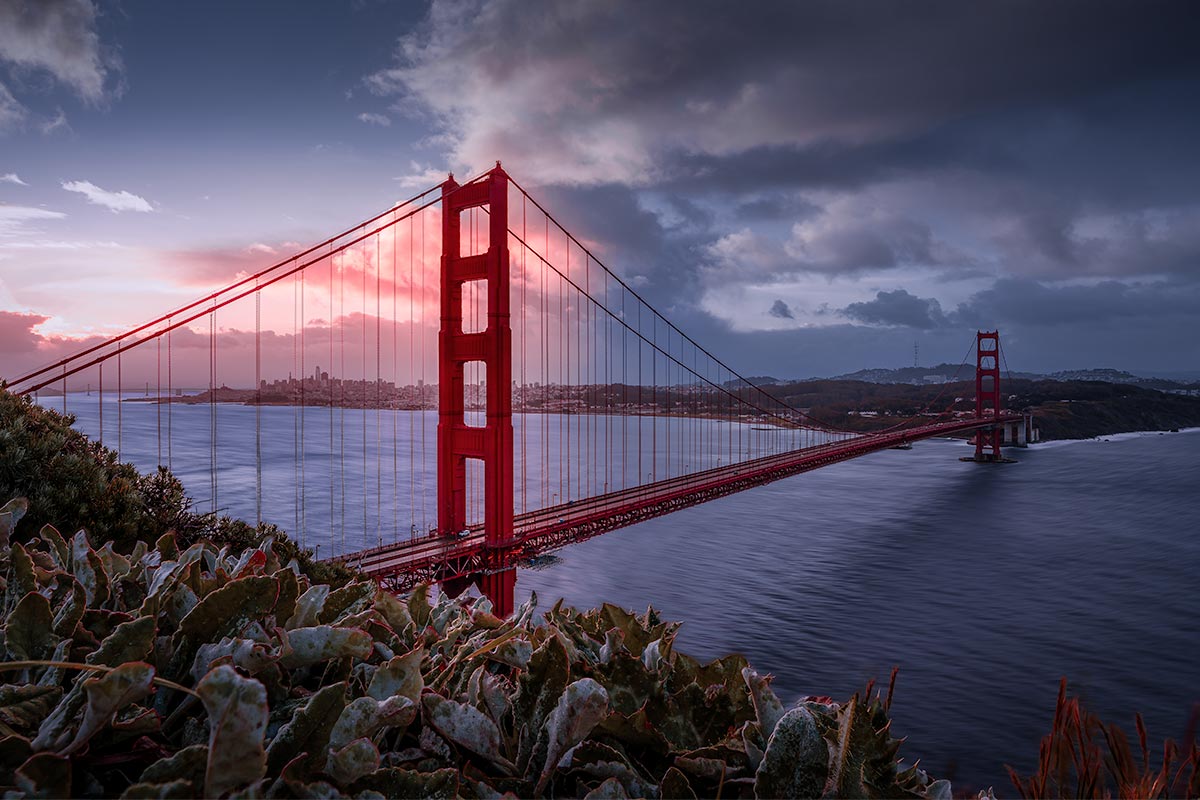 Golden Gate Bridge at sunset from Battery Spencer in the Marin Headlands with dramatic clouds